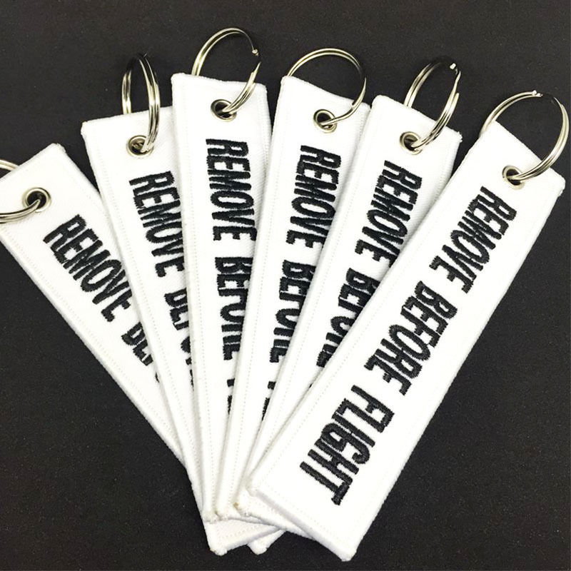 Remove Before Flight Double-sided Keychain Aviation White
